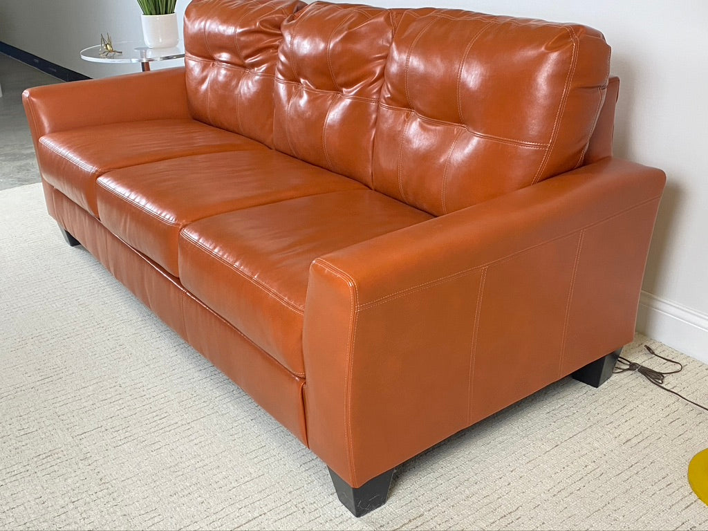 Ashley Furniture Orange Paulie Durablend Sofa