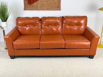 Ashley Furniture Orange Paulie Durablend Sofa